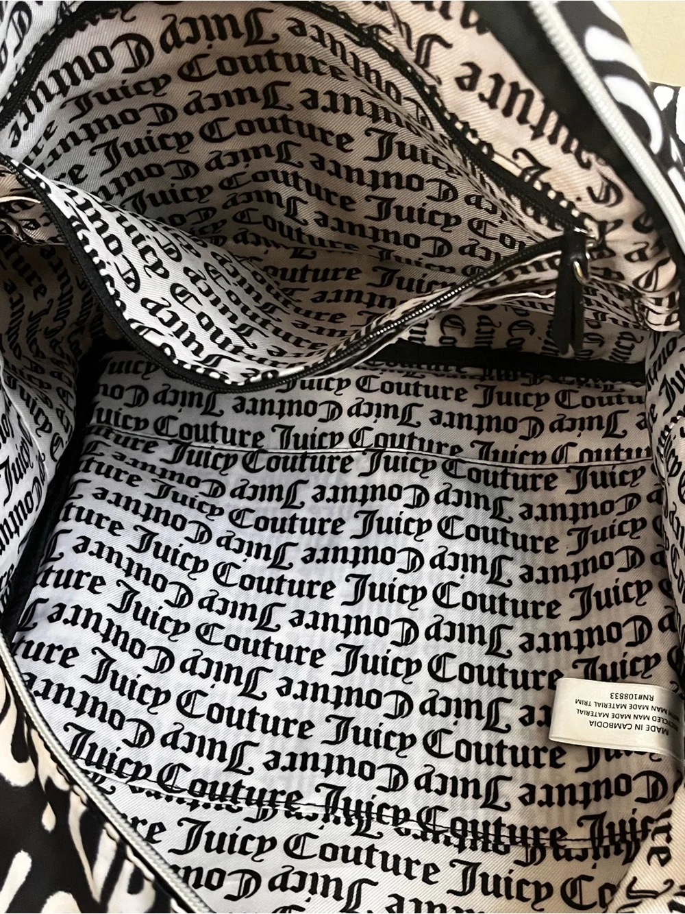Juicy Couture 15”l 13”w
